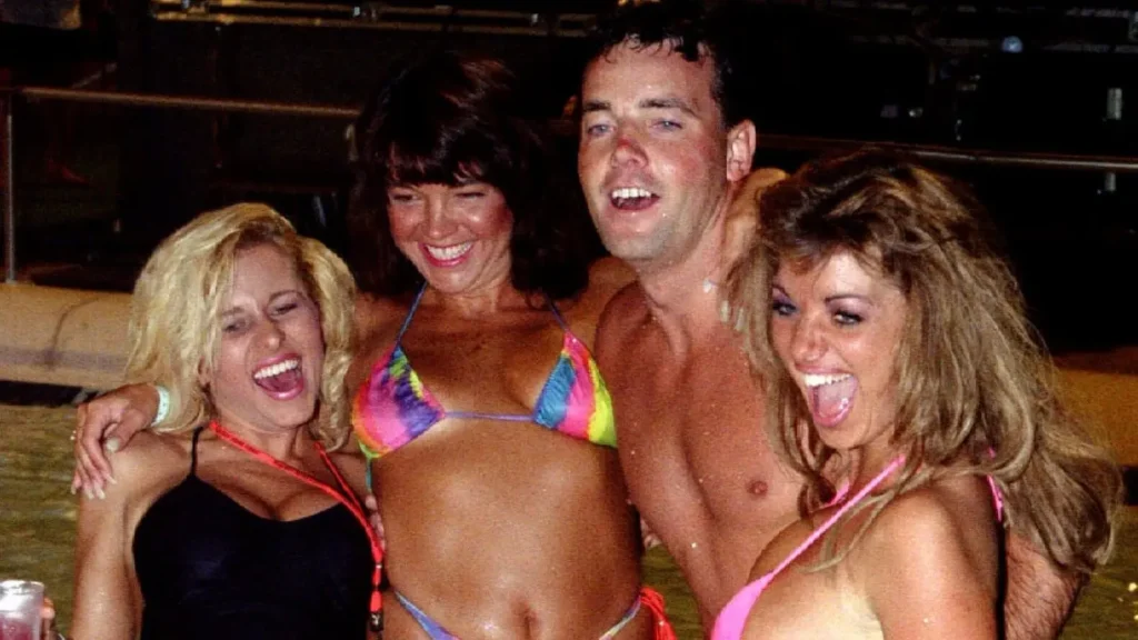 John Wayne Bobbitt, infamous for the incident in 1993 when his wife severed his penis, is seen enjoying himself in a pool at Wet and Wild, a Las Vegas water park, alongside Playboy Playmates on July 26, 1994. Bobbitt attended the Playboy party, which coincided with the 13th Annual VSDA Home Video Convention.